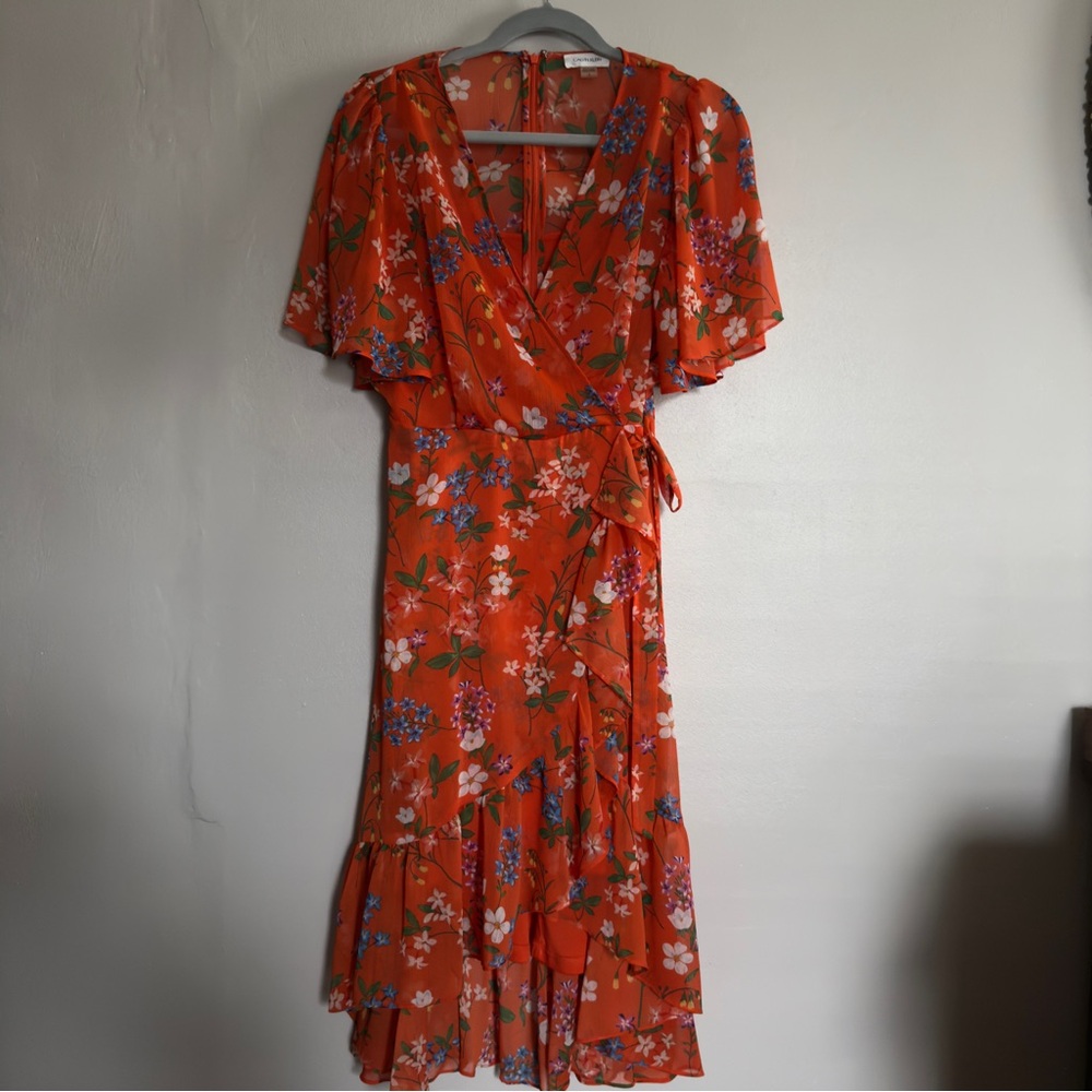 Orange Calvin Klein high low midi dress